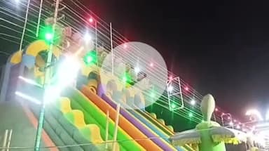 बदायूं: गांधी ग्राउंड में लगी नुमाइश में झूलों के ऊपर से जा रही हैं विद्युत लाइनें, कभी भी हो सकता है बड़ा हादसा