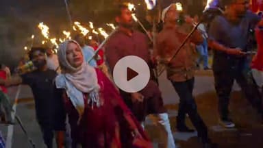 कल आहूत आम हड़ताल की तैयारी में मशाल जुलूस के दौरान एआईएसएफ के राष्ट्रीय सचिव अमीन हमजा