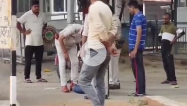 पटना ग्रामीण: CM आवास के बाहर युवक का हाई वोल्टेज ड्रामा, पीएम आवास और नौकरी नहीं मिलने से पुलिस गाड़ी के नीचे लेटा