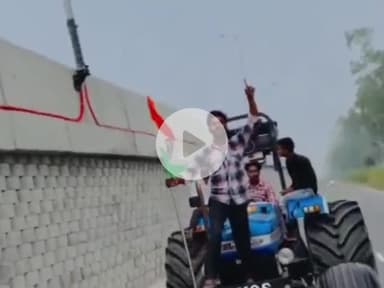 धनौरा: गजरौला हाईवे पर ट्रैक्टर से खतरनाक स्टंट करते युवक का वीडियो हुआ वायरल, पुलिस जांच में जुटी