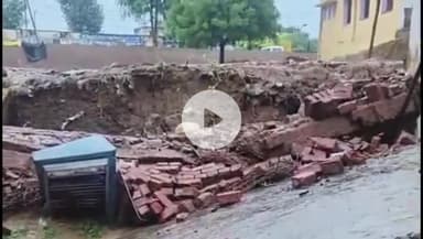 करौली: बारिश का असर गुढ़ाचंद्रजी में सामुदायिक स्वास्थ्य केंद्र के नवीन भवन की निर्माणाधीन दीवार गिरी, कार हुई क्षतिग्रस्त