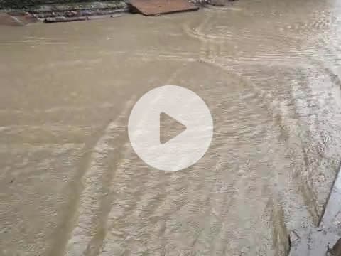 akodiya me bhari  barish  ke chalte   Nadi  nale ufan pe