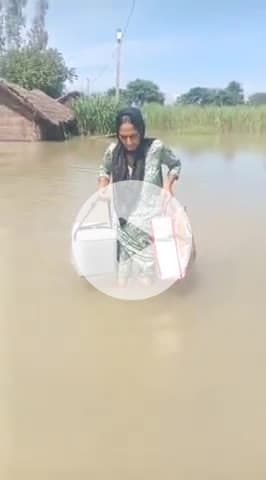 पूरनपुर: राघवपुरी में बाढ़ के बीच ड्यूटी निभाकर मिसाल बनीं एएनएम मंजीत रानी