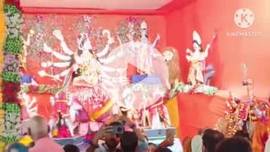 बक्सर: नगर के सिंडिकेट के पास इलेक्ट्रिक व्यवस्था से बनी प्रतिमा श्रद्धालुओं के लिए बनी आकर्षण का केंद्र