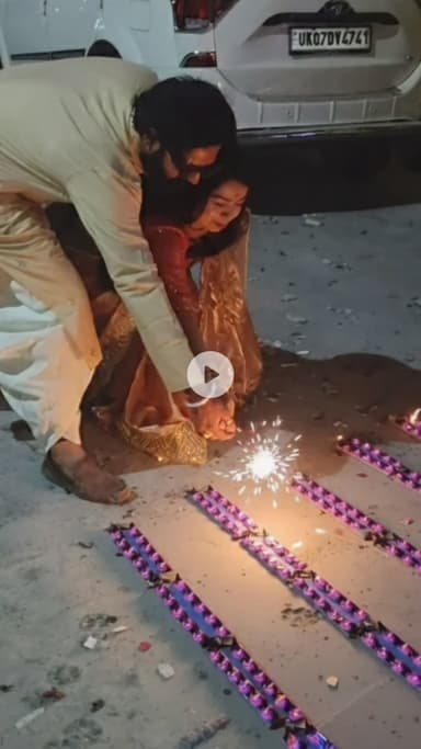 My light, my love, and a thousand beautiful sparks 😍 The sky's on fire for us. Happy Diwali! ✨ #Diwali #Deepavali