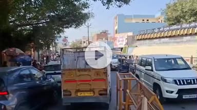 अमरोहा: अमरोहा शहर के टीपी नगर से लेकर बिजनौर मार्ग पर लगा जाम, यातायात व्यवस्था हुई ठप