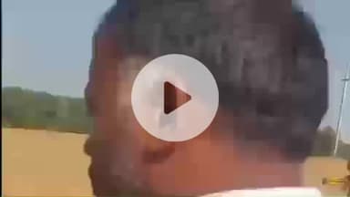 तोशाम: खेतों में जबरदस्ती हाईटेंशन बिजली के तार बिछाने का किसानों ने किया विरोध, काम रुकवाया