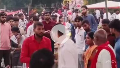 नौतनवा: अड्डा बाजार में मेले के दौरान महिला ने युवक को पीटा, वीडियो हुआ वायरल