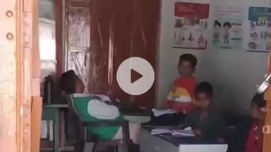 गाज़ीपुर: क्लासरूम में सोते शिक्षक का वीडियो वायरल, शिक्षा विभाग एक्शन में, एबीएसए ने कहा- दोषी पाए जाने पर होगी कार्रवाई