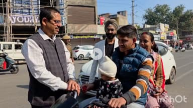 भीलवाड़ा: परिवहन विभाग और यातायात पुलिस ने वाहन चालकों को गुलाब का फूल देकर यातायात नियमों के प्रति किया जागरूक