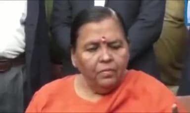 हुज़ूर: उमा भारती ने भोपाल में शराब की दुकान के सामने मदिर में डाला डेरा, बोलीं- यहीं बैठकर सरकार की शराब नीति सुनूंगी