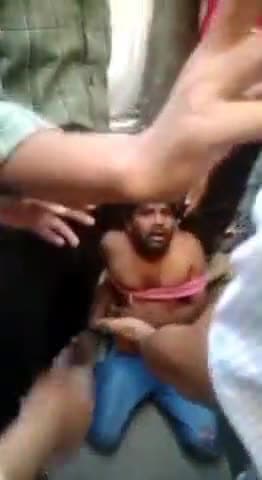 पलवल: खंभे से बंधे कथित बच्चा चोर का पलवल में सोशल मीडिया पर वीडियो हुआ वायरल, 7-8 वर्ष की बच्ची को अगवा करने का है आरोप