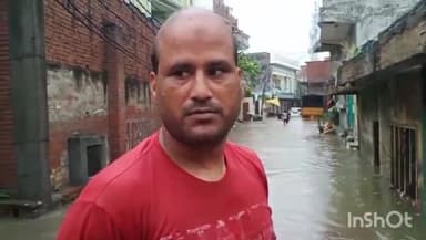 मोदीनगर: व्यापारीयन कॉलोनी में तेज बारिश के कारण हुआ जलभराव, लोगों को करना पड़ रहा समस्याओं का सामना