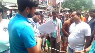 पालीगंज: पालीगंज बाजार स्थित मत्स्य विभाग के तालाब को अतिक्रमण से मुक्त करने के लिए नापी की प्रक्रिया जारी