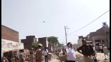 दातागंज: नगर में होली और चुनाव को देखते हुए एसडीएम ने पैदल मार्च कर ड्रोन से निगरानी की,