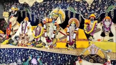 मथुरा: वृंदावन में शीतकालीन सेवा के तहत ठाकुर राधावल्लभ को ऊनी वस्त्र पहनाकर अंगीठी से सिकाई की गई