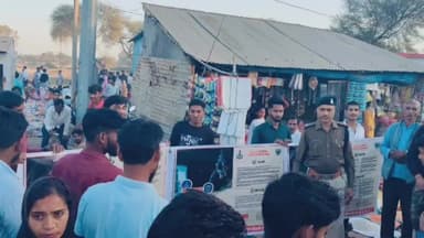 माडा: बंधौरा पुलिस ने बाजारों में साइबर अपराधों के विरुद्ध जागरूकता अभियान चलाया