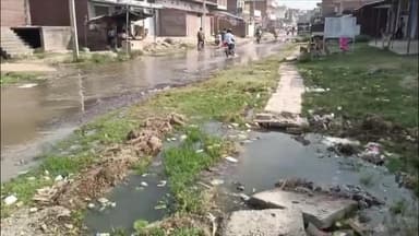 ज्ञानपुर: ज्ञानपुर नगर के हरिहरगंज में नाला टूटा, सड़क पर बह रहा गन्दा पानी