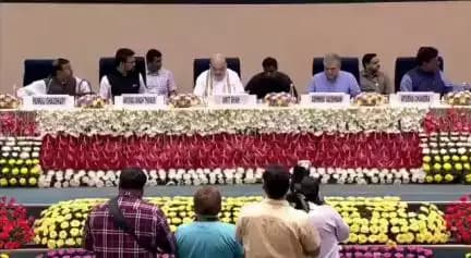 Union Home Minister Amit Shah releases commemorative postage stamp and coin on 100 episodes of Mann Ki Baat