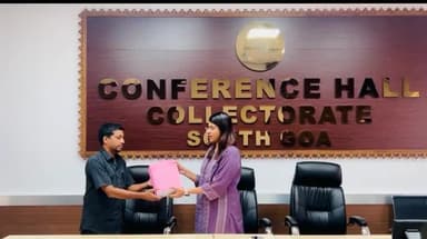 The DEO South Goa Egna Cleetus,IAS handing over the the copy the Draft Electoral Roll of SIR 2026 to the representatives of political parties