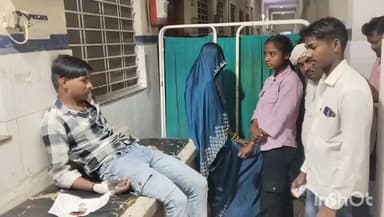 बाड़ी: खड़ी स्कूटी से टकराई बाइक, 3 लोग हुए घायल