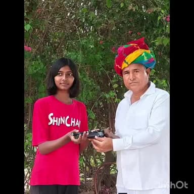 देवली: विधायक राजेंद्र गुर्जर ने राष्ट्रीय निशानेबाज राधिका मीना को भेंट की गन