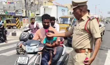 టేక్మల్: గులాబీ పువ్వులు ఇచ్చి చేతులెత్తి దండం పెట్టిన పోలీసులు