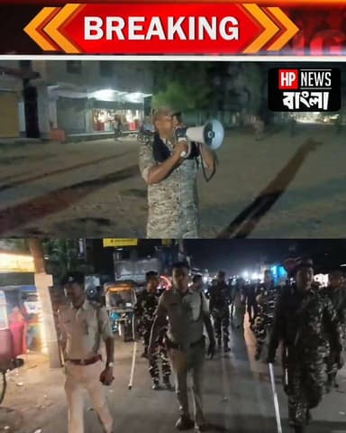 রানীনগর শেখপাড়া বাজারে ১৪৪ ধারা। মাইক হাতে সতর্ক করছে পুলিশ