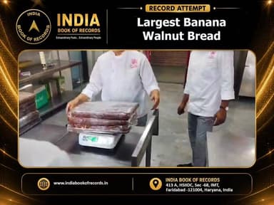Largest Banana Walnut Bread
A massive 30-ft-long and 200-kg banana walnut bread was created at JECRC University, Jaipur, by chefs, faculty members, and students of the School of Hospitality. The giant bread was later shared with underprivileged children through the ‘Zarurat’ initiative, blending culinary excellence with a meaningful social cause.
#IndiaBookOfRecords #BananaWalnutBread #JECRCUniversity #FoodRecord #Jaipur #CulinaryExcellence