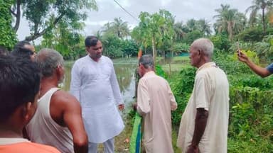 *উপকূলে আছড়ে পড়তে পারে দুর্যোগ! গঙ্গাসাগরে মাইকিং করে কড়া সতর্কতা প্রশাসনের, ফ্রেজারগঞ্জে দুর্গতদের সঙ্গে দেখা করলেন সাগরের বিধায়ক*
অমিত মণ্ডল, গঙ্গাসাগর:
বঙ্গোপসাগরে ফুঁসছে গভীর নিম্নচাপ! আর তার জেরেই দক্ষিণবঙ্গের উপকূলবর্তী এলাকাগুলিতে ঘনিয়ে আসছে বড়সড় দুর্যোগের আশঙ্কা। আলিপুর আবহাওয়া দফতরের পূর্বাভাস অনুযায়ী, সোম থেকে বুধ,টানা তিন দিন দক্ষিণ ২৪ পরগনা-সহ উপকূলবর্তী জেলাগুলিতে ভারী থেকে অতি ভারী বৃষ্টির সতর্কতা জারি করা হয়েছে। পাশাপাশি ঘণ্টায় ৪০ থেকে ৬০ কিলোমিটার বেগে বইতে পারে ঝোড়ো হাওয়া। উত্তাল সমুদ্রের ভ্রুকুটি সামলাতে গঙ্গাসাগর, বকখালি, নামখানা থেকে পাথরপ্রতিমা পর্যন্ত সুন্দরবনের বিস্তীর্ণ উপকূলে জারি করা হয়েছে সতর্কতা।
সবচেয়ে বেশি নজরদারি চালানো হচ্ছে গঙ্গাসাগরের কপিল মুনির আশ্রম চত্বর, স্নানঘাট এবং সমুদ্র সৈকত এলাকায়।
সমুদ্রের জলস্তর অস্বাভাবিকভাবে বৃদ্ধি পাওয়ার আশঙ্কায় পুণ্যার্থী এবং পর্যটকদের নিরাপত্তায় সাগর ব্লক প্রশাসনের পক্ষ থেকে সৈকত এলাকায় সোমবার লাগাতার মাইকিং করা হয়। গভীর সমুদ্রে মাছ ধরতে যাওয়ার ওপর সম্পূর্ণ নিষেধাজ্ঞা জারি করা হয়েছে এবং যে ট্রলার বা নৌকাগুলি মাঝসমুদ্রে রয়েছে, তাদের দ্রুত নিরাপদে উপকূলে ফেরার নির্দেশ দেওয়া হয়েছে।
সৈকতে ও গুরুত্বপূর্ণ স্থানে বিপর্যয় মোকাবিলা বাহিনী, সিভিল ডিফেন্স কর্মী এবং পুলিশ মোতায়েন করা হয়েছে।
সাগর ব্লকের বিডিও কানাইয়া কুমার রাও জানিয়েছেন, "প্রশাসনের মূল লক্ষ্য মানুষের নিরাপত্তা নিশ্চিত করা। আবহাওয়া দফতরের পূর্বাভাস মেনে আগামী কয়েকদিন ভারী বৃষ্টি ও জলোচ্ছ্বাসের কথা মাথায় রেখে উপকূলের বাসিন্দাদের নিরাপদ আশ্রয়ে সরিয়ে নেওয়ার সমস্ত প্রস্তুতি আমাদের রয়েছে।"
অন্যদিকে, বিপর্যয় মোকাবিলা বাহিনীর কর্মী কুন্তল বর জানান, স্নানঘাটগুলিতে কড়া নজরদারি চলছে। অনেক সময় পর্যটকরা সতর্কতা উপেক্ষা করে জলে নেমে পড়েন, সেই প্রবণতা রুখতে প্রয়োজনে সমুদ্রস্নান সম্পূর্ণ বন্ধ করে দেওয়ার সিদ্ধান্তও নিতে পারে প্রশাসন।
দুর্যোগ মোকাবিলায় নদীবাঁধগুলির ওপরও বিশেষ নজর রাখছে সেচ দফতর, বিপর্যয় মোকাবিলা দফতর ও স্থানীয় প্রশাসন।
অন্যদিকে বেশ কয়েকদিন টানা বৃষ্টির কারণে জল নিকাশির সমস্যায় নামখানার ফ্রেজারগঞ্জের অমরাবতী গ্রামের বেশ কয়েকটি বাড়ি জলমগ্ন হয়ে পড়ে। বর্তমানে প্রায় ১৫ টি পরিবারের লোকজন ঘর ছেড়ে হোটেলে আশ্রয় নিয়েছে। জল না নামায় এবং আবারো পুনরায় দুর্যোগপূর্ণ আবহাওয়ার কথা শুনে আতঙ্কে ভুগছেন অমরাবতী গ্রামের চন্দন পাত্র, বিশ্বনাথ দাস, সৌমেন মান্নাদের মতো বহু পরিবার।
ইতিমধ্যেই দূর্গত পরিবার গুলির সঙ্গে দেখা করে গিয়েছেন সাগর বিধানসভার বিধায়ক সুমন্ত মন্ডল। বিধায়ক জানান, টানা বৃষ্টি এইভাবে কোনদিন এই এলাকায় হয়নি। তবে জল লেখা সেটা সমস্যা রয়েছে তিনি স্বীকার করে বলেন। জলটা একটু নামলেই প্রশাসনের পক্ষ থেকে নিকাশি ব্যবস্থা পুরোপুরি সচল করা হবে।
