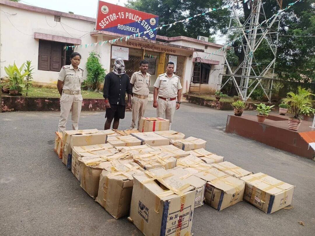 Illegal Firecracker Godown Busted in Rourkela, Firecrackers Worth ₹1.5 Lakh Seized
Rourkela, September 3, 2026 (SatyaNewsAlert) : Police detected an alleged illegal firecracker godown at Utkal Basti in Sector-18 under Sector-15 police limits in Rourkela on Thursday and seized a large quantity of firecrackers stored without a valid licence.
According to police, SI Ambika Marndi of Sector-15 Police Station detected the godown and seized 22 packed cartons containing different types and brands of firecrackers, weighing a total of 265.08 kg. The seized firecrackers are estimated to be worth around ₹1.5 lakh.
During verification, the godown was found to belong to Deepak Kumar Sha (28), son of Bijay Sha, a resident of Sector-18 Utkal Basti under Sector-15 police limits.
Police said that when asked to produce a licence or other valid documents authorising possession and storage of the firecrackers, Sha allegedly failed to provide any such licence. He reportedly stated that the firecrackers had been stored for sale to the general public for personal gain.
The accused was apprehended by police in connection with the case. His criminal antecedents are yet to be verified.
Seized: 22 cartons of assorted firecrackers weighing 265.08 kg, valued at approximately ₹1.5 lakh.
Investigation Officer: ASI Jugal Bagarty of Sector-15 Police Station, Rourkela.