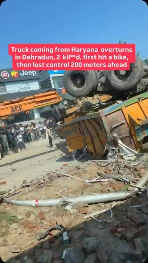 A cement-laden truck from Haryana overturned in Dehradun this morning, killing two people on the spot and leaving two others in critical condition.The truck then went out of control and overturned about 200 meters ahead. The accident occurred this morning at Mohbbewala on the Delhi-Dehradun Highway. The truck was coming from Asharodi towards the city. Upon receiving information, the ISBT outpost in-charge, the Clement Town fire team, and the Patel Nagar police arrived at the scene.