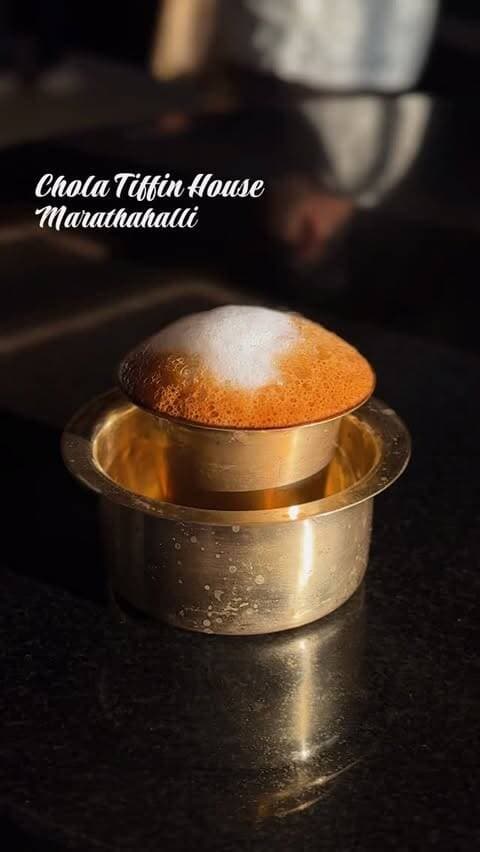 A new pure vegetarian South Indian QSR has opened in Marathahalli, and it’s covering the full day — breakfast through dinner.
@cholatiffinhouse brings together familiar favourites from Karnataka, Andhra/Telangana and Tamil Nadu. The dosa selection alone is worth the visit — Benne Dosa, Ghee Podi Dosa, Garlic Roast Masala Dosa and more. Breakfast has your Idli, Thatte Idli, Vada and Rice Bath. Lunch gets you a proper South Indian Thali. Evening is for Maddur Vada, Mangalore Bajji and Bonda Soup. Dinner rounds off with Akki Roti, Ragi Roti and a few wok-tossed rice dishes. Finish with one of their halwas and a filter coffee.
The space is clean and comfortable — this is everyday South Indian food done with some care and consistency.
Chola Tiffin House, Marathahalli.
92/6, outer ring road, Munnekollalu, extn, Marathahalli, Bengaluru, Karnataka 560037
#vinaysathyam #marathahalli #bangalorebreakfastwalks #bangalore #bengaluru