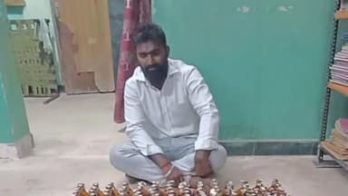 திண்டிவனம்: பெரும்பாக்கம் சோதனை சாவடியில் புதுச்சேரி மது பாட்டில் கடத்து வந்த நபர் கைது