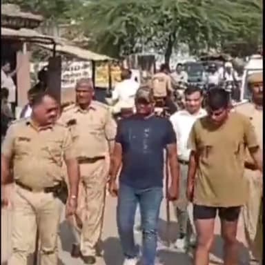 राजगढ़: धोलागढ़ देवी थाना पुलिस ने लेक्चर पर फायरिंग के मामले में दो बदमाशों को किया गिरफ्तार, निकाला गया जुलूस