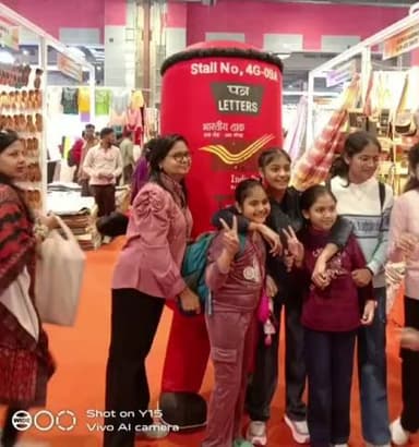 All smiles at the India Post Stall 4G-09A, IITF 2025! A teenager recommending to use Aadhaar service from Post Offices.